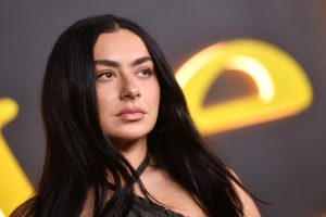 Charli XCX Stomps on a Table and Breaks the ‘Chains of Love’ in New Music Video