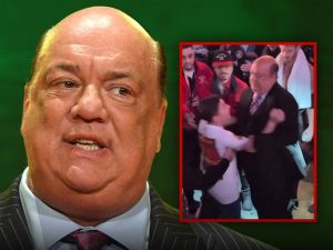 WWE Star Paul Heyman Shoves Young Fan Away From Logan Paul, on Video
