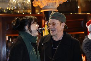 Bono and Imelda May Bring ‘Christmas (Baby, Please Come Home)’ to the Streets of Dublin