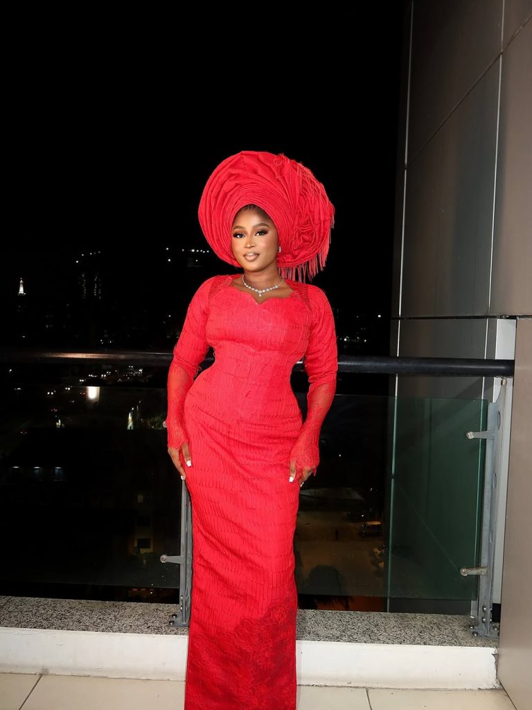 Imisi’s Coral-Red Asooke Look is A Timeless Masterclass in Festive Nigerian Fashion