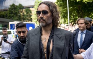 Russell Brand hits out at ex-wife Katy Perry’s new partner, the “globalist stooge” Justin Trudeau